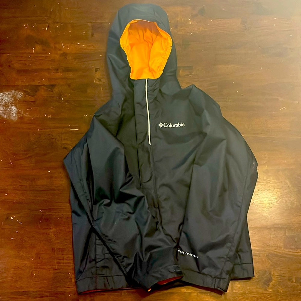 Youth XS (size 6-7) Watertight Rain jacket. Navy with orange accents.